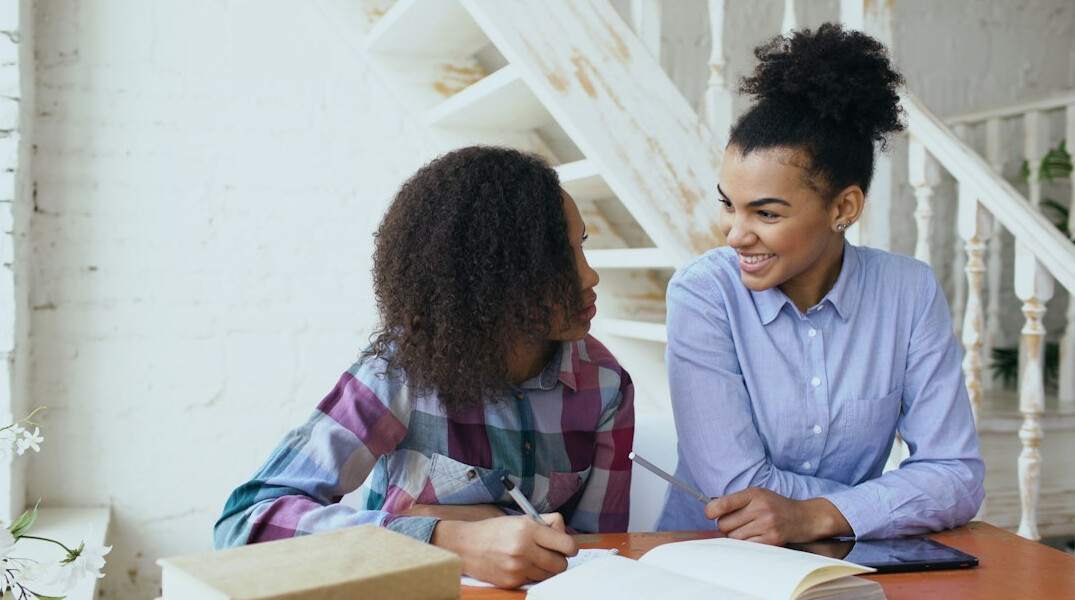 family discussing finances at home table
