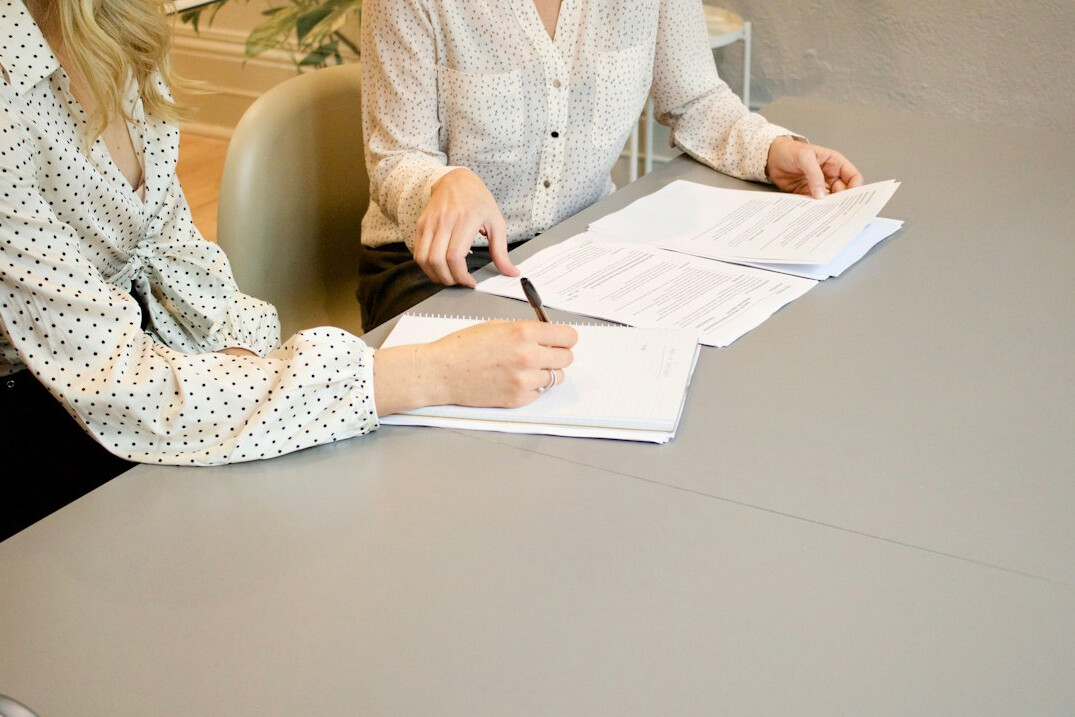 woman reviewing financial documents