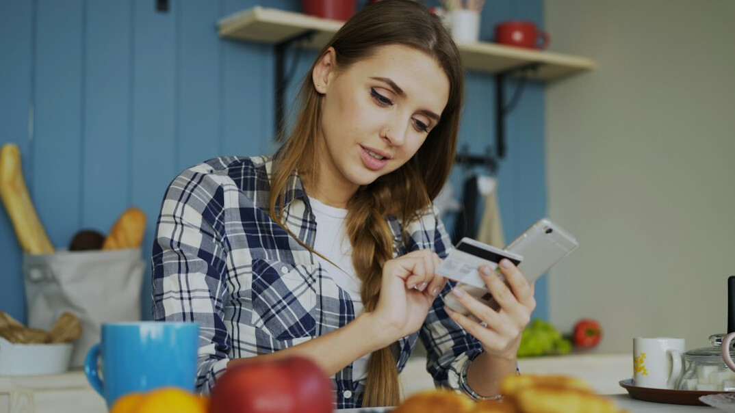 woman reviewing finances at home